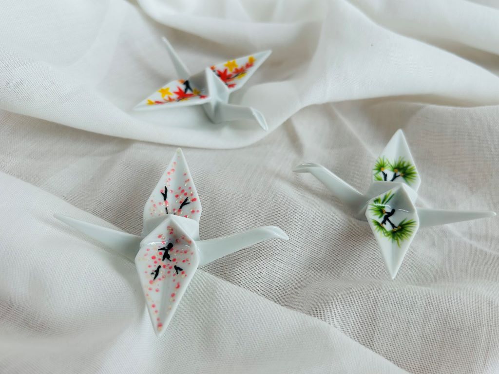 Porcelain origami crane "Pine of Longevity" standing
