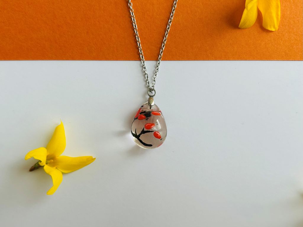 Glass necklace "Rosehip Tea"