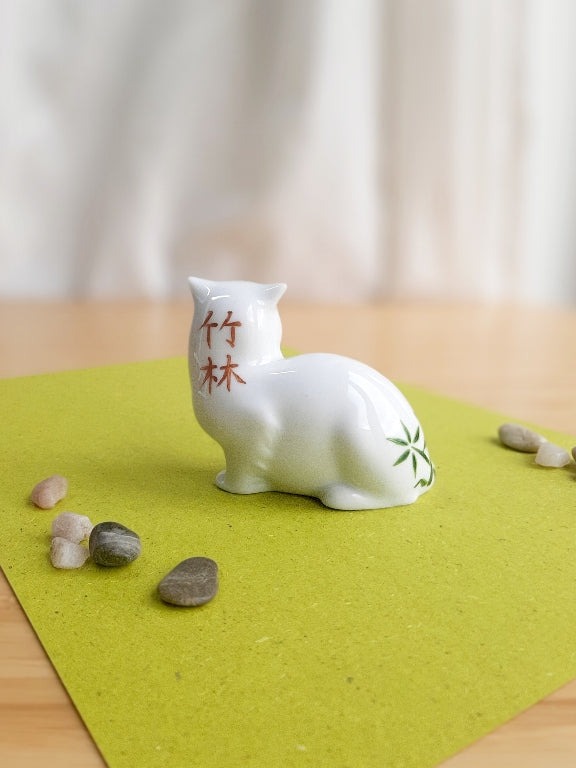 porcelain kitten with various motifs from Japanese gardens
