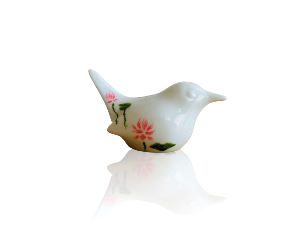 porcelain bird with various Japanese garden motifs