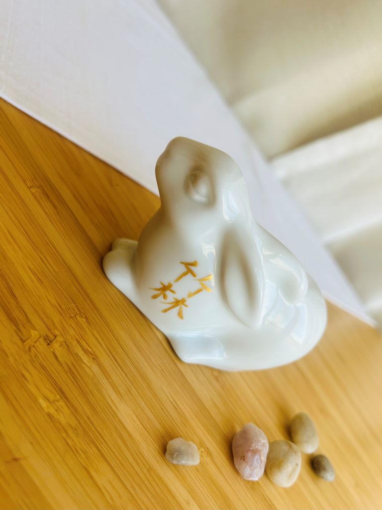 porcelain bunny with various Japanese garden motifs