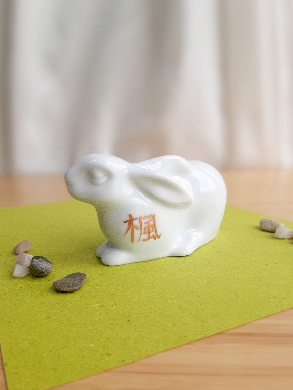 porcelain bunny with various Japanese garden motifs
