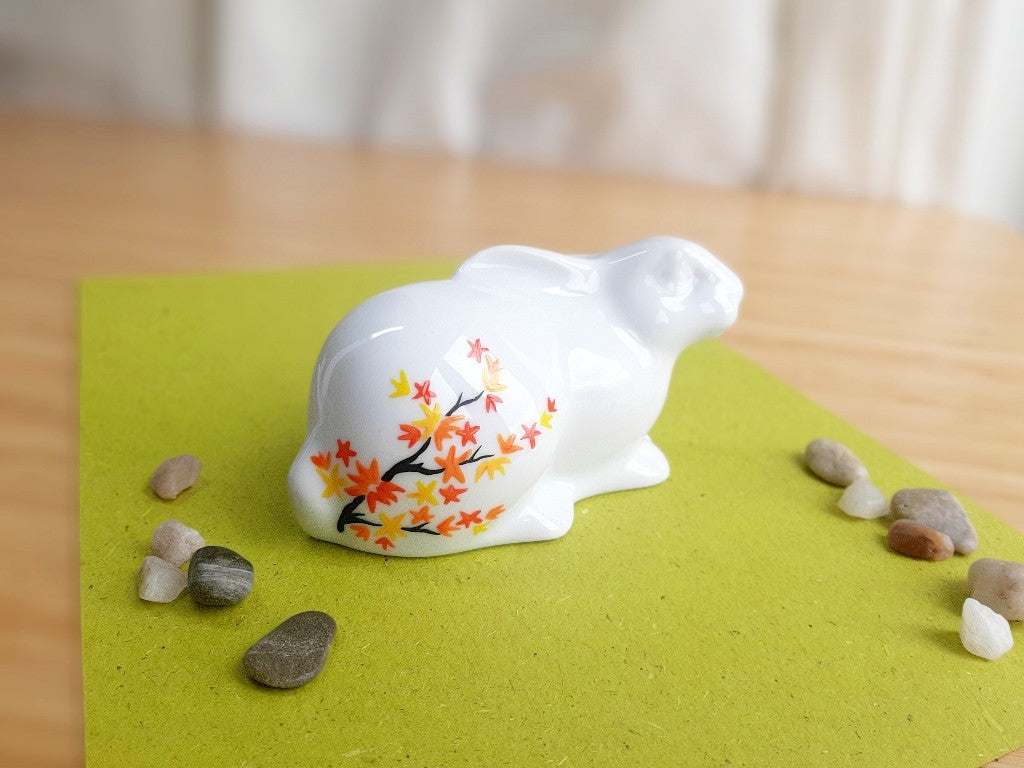 porcelain bunny with various Japanese garden motifs