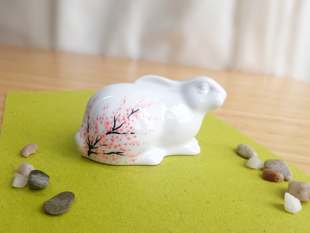 porcelain bunny with various Japanese garden motifs