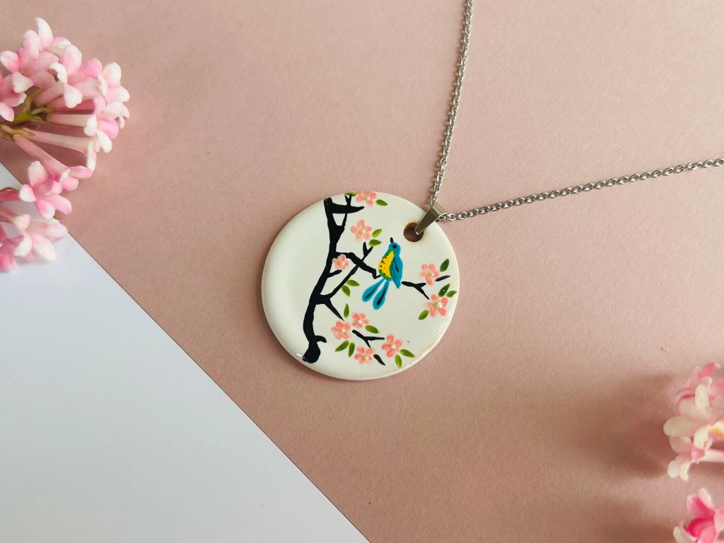 Ceramic necklace "Bird on a Cherry Blossom"