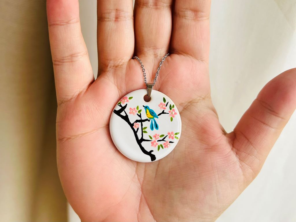 Ceramic necklace "Bird on a Cherry Blossom"