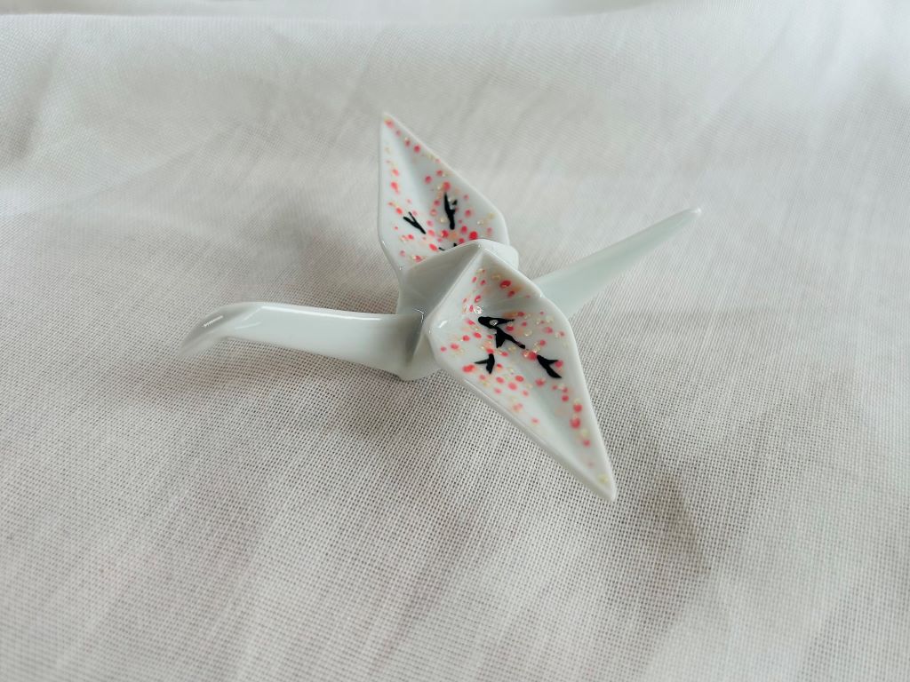 porcelain origami crane "Morning under the Sakura" standing