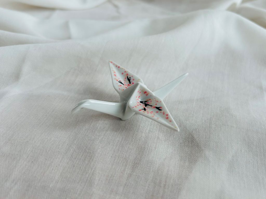 porcelain origami crane "Morning under the Sakura" standing