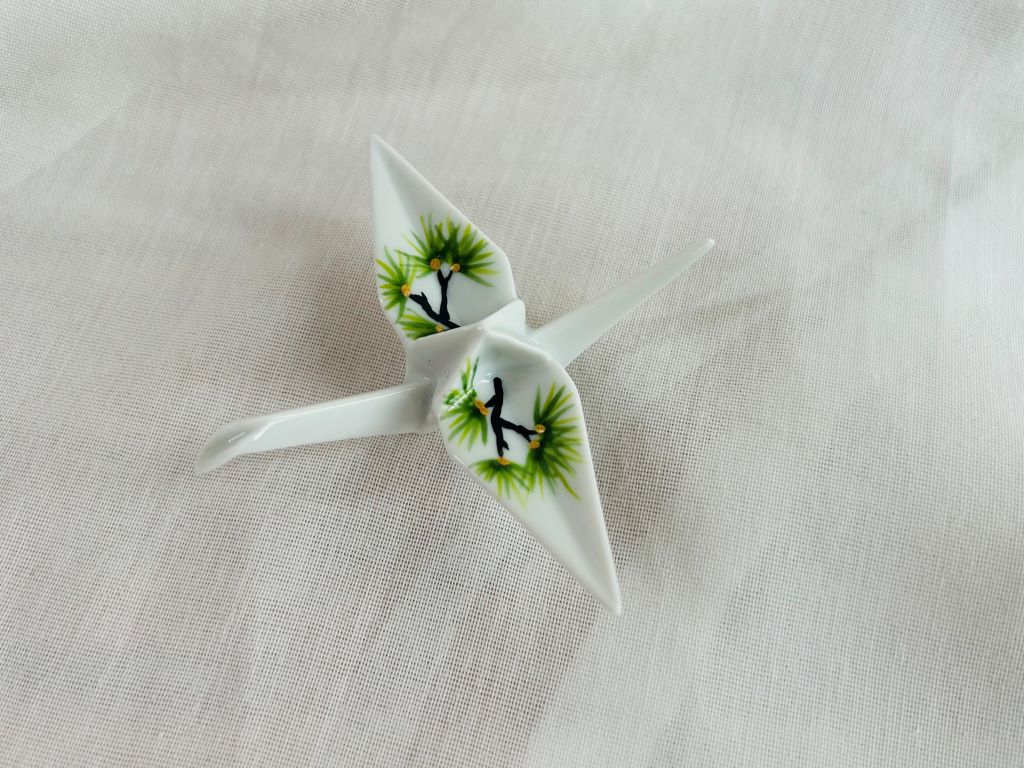 Porcelain origami crane "Pine of Longevity" standing