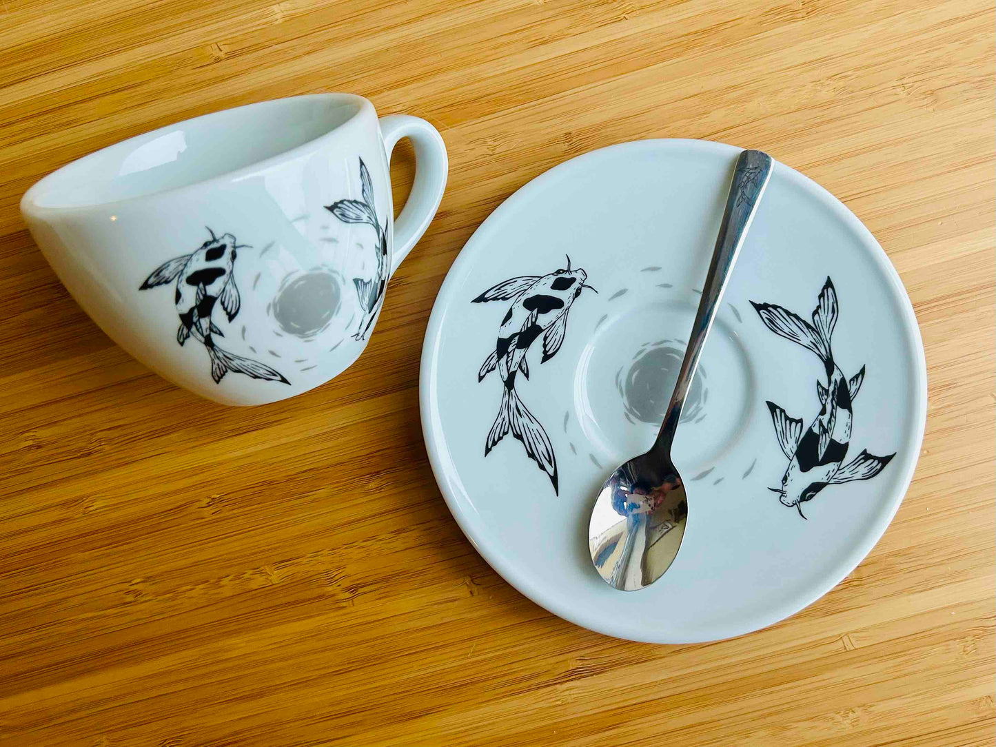 cup and saucer "Koi carp with moon" with a custom spoon